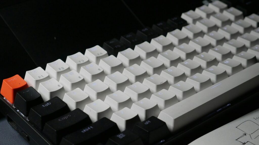 Firmware engineering for high-speed touch typing: dual-function tap/hold keys, b